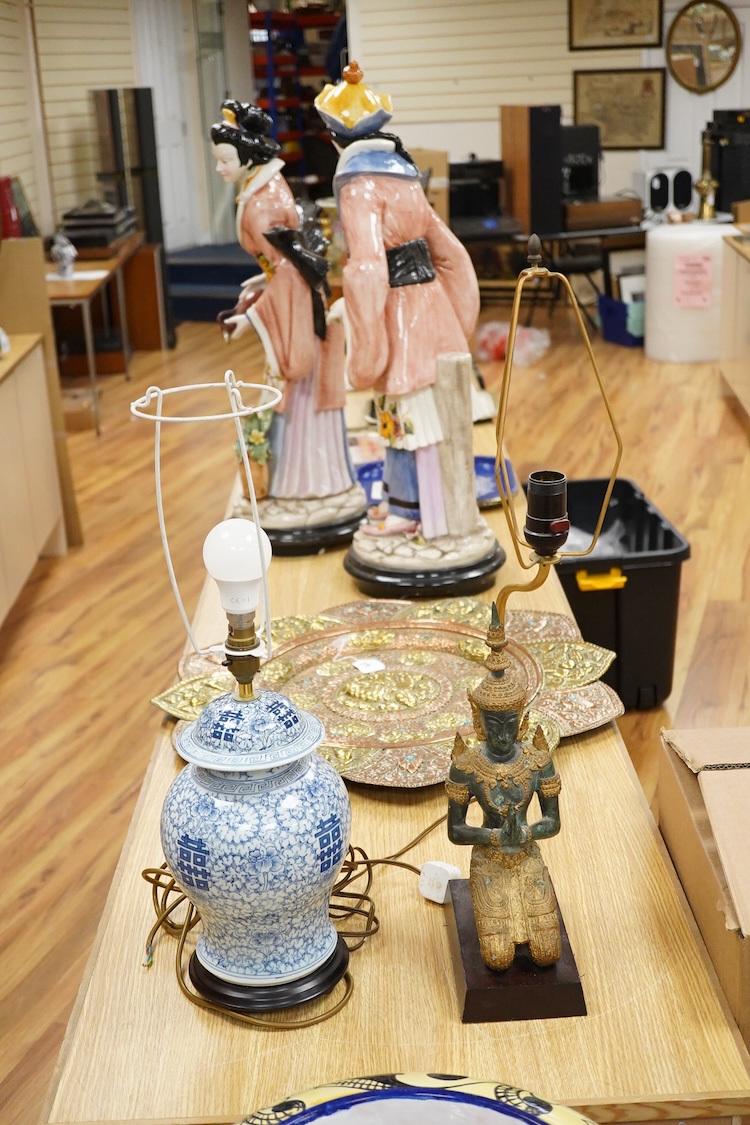 A pair of brass candlesticks and a gilt metal two branch gilt candelabrum, 45cm high